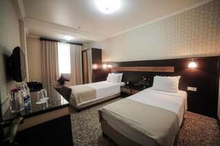 Отель Onyx Hotel Bishkek Бишкек Стандартный двухместный номер с 2 отдельными кроватями-4